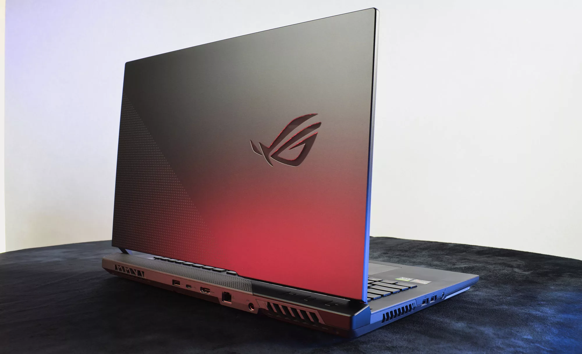 ROG Strix G17 standing open, emphasis on the lid.