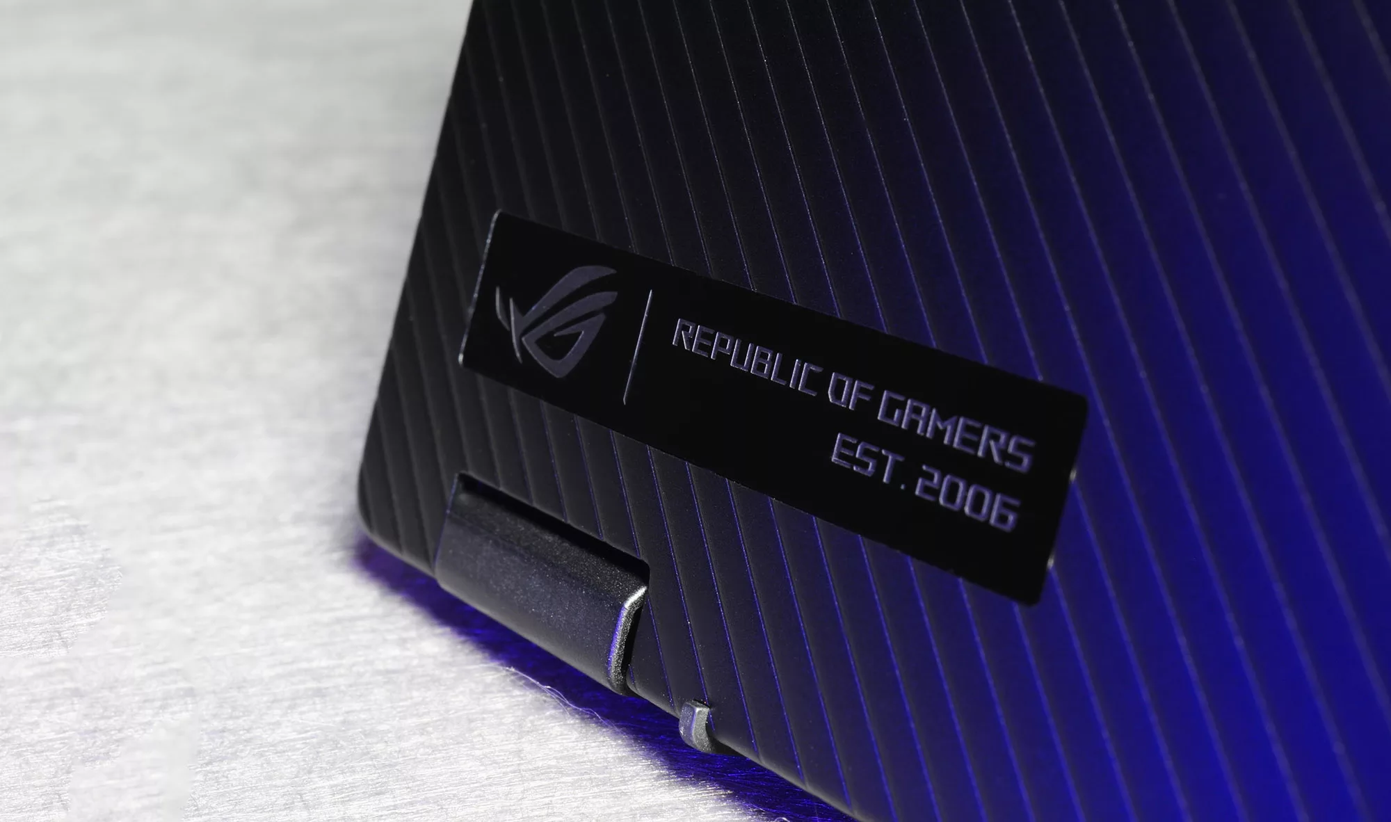 Closeup shot of the ROG logo on the Flow X13.