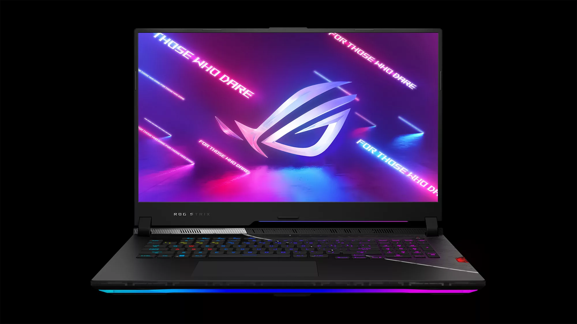 Strix SCAR laptop with ROG eye logo visible on the screen.