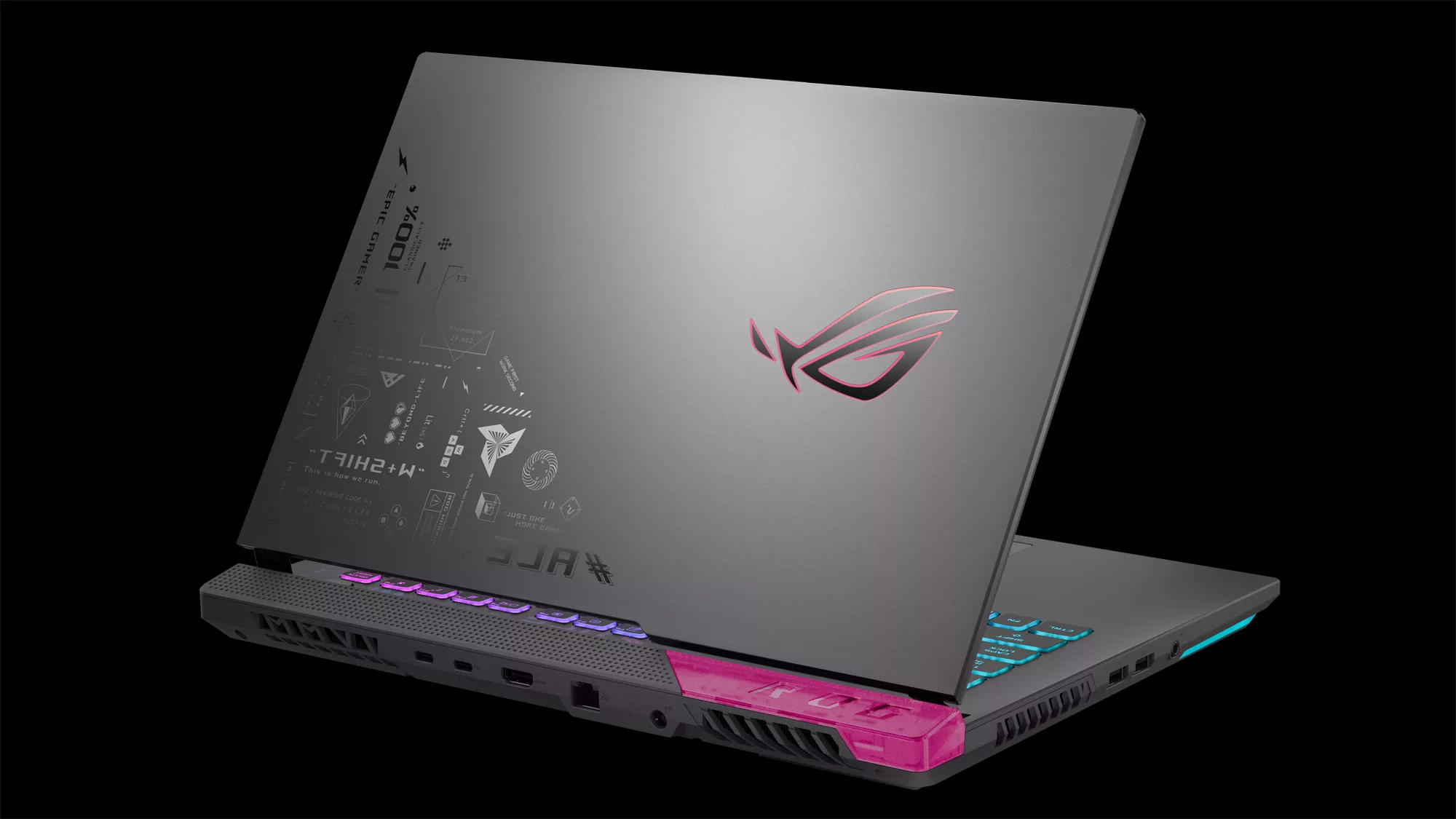Rear view of pink accented Strix G, featuring cyberpunk accents on the laptop lid.