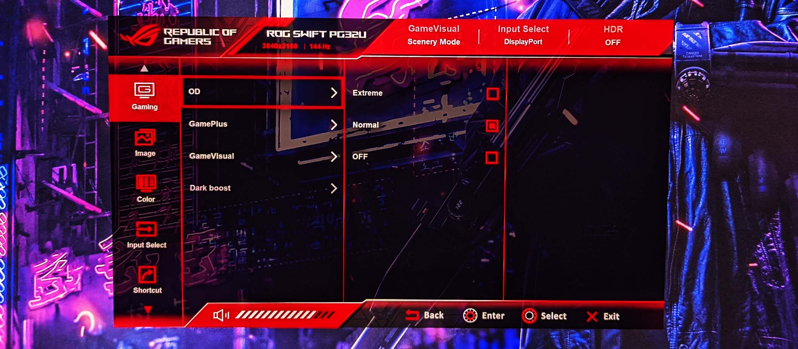 A photo of an ROG monitor's overdrive setting, with three options: Extreme, Normal, and Off.