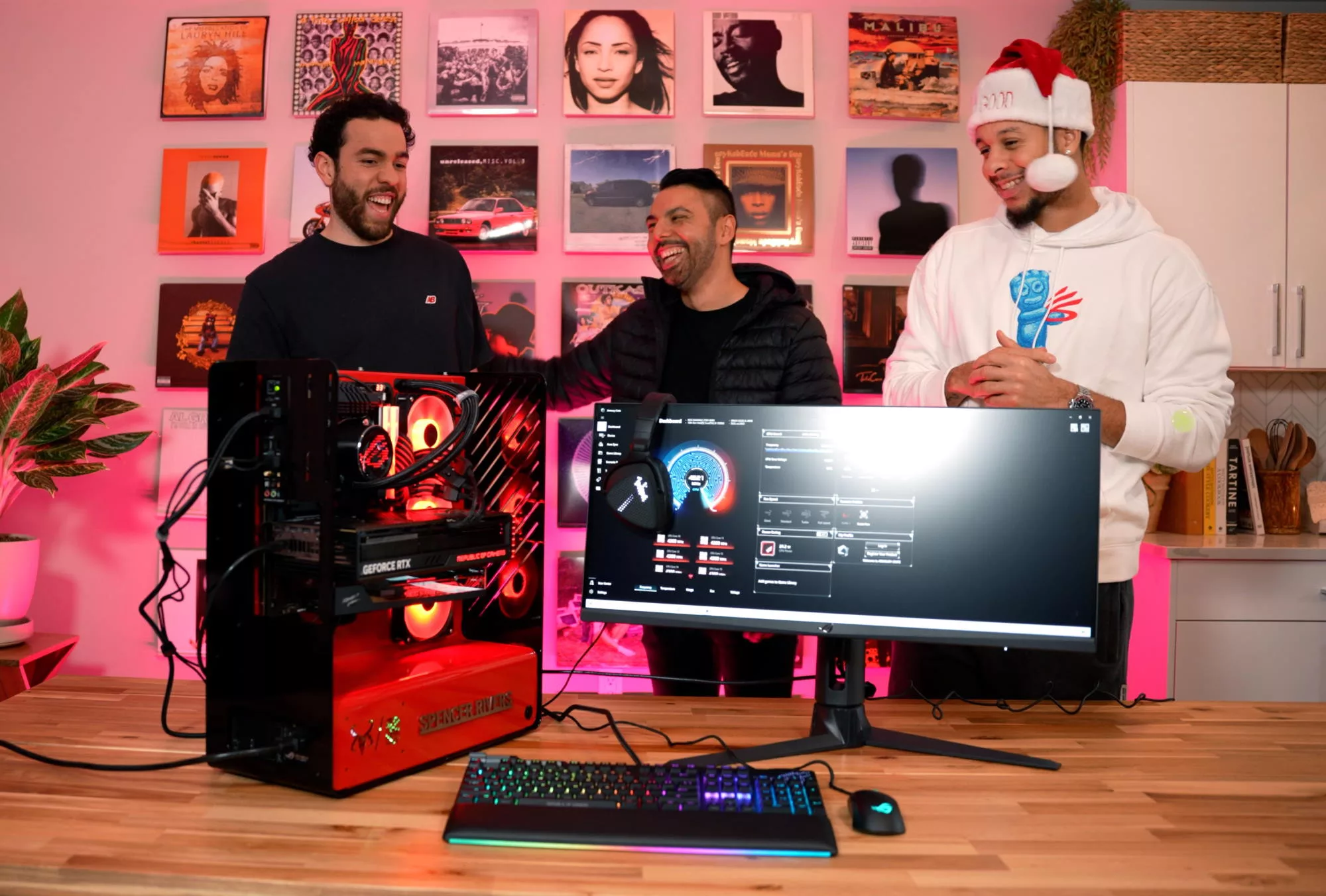 Seth, Ben, and Spencer all admire the finished and running gaming PC build