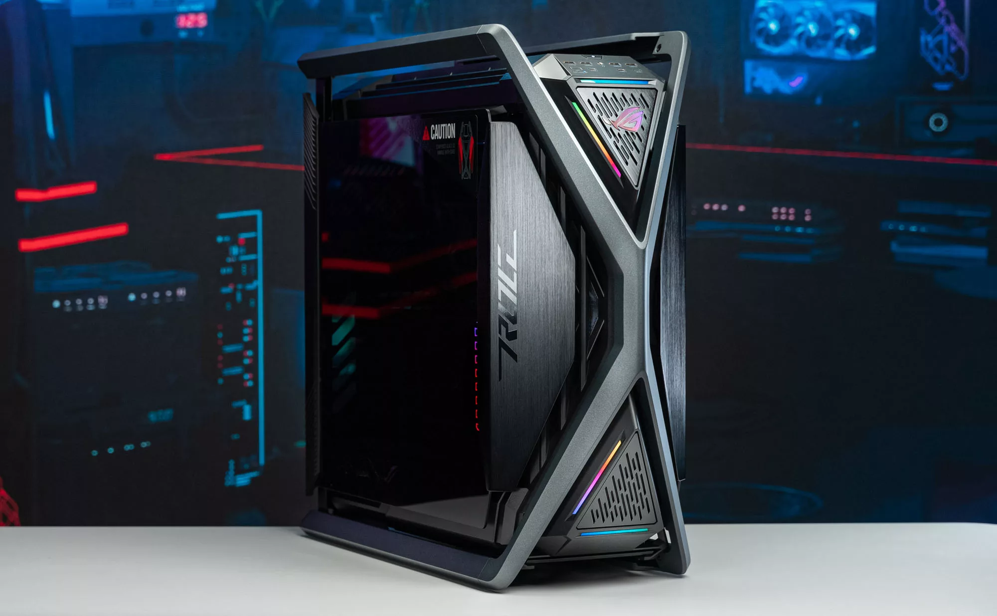 A front view of the ROG Hyperion case with its RGB logo illuminated.