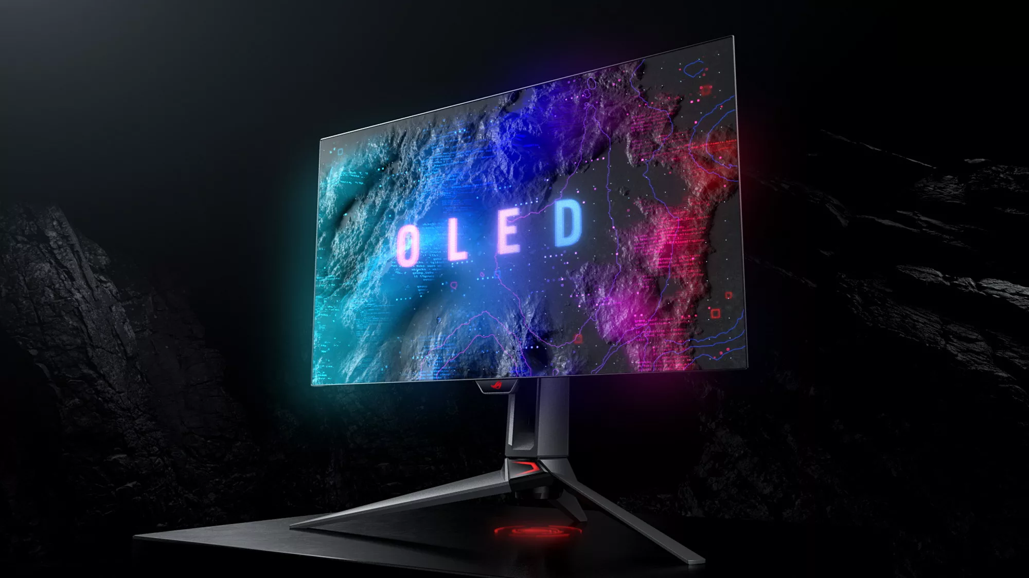 The ROG Swift OLED PG27AQDM monitor on a black background with the screen displaying the letters 