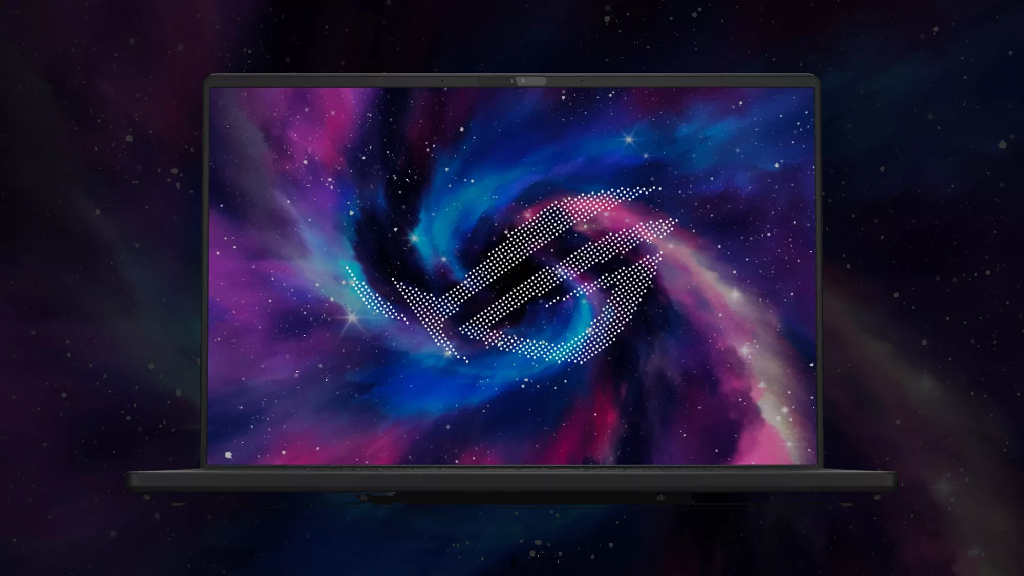 A laptop against the backdrop of space, with a dotted ROG logo on the screen.
