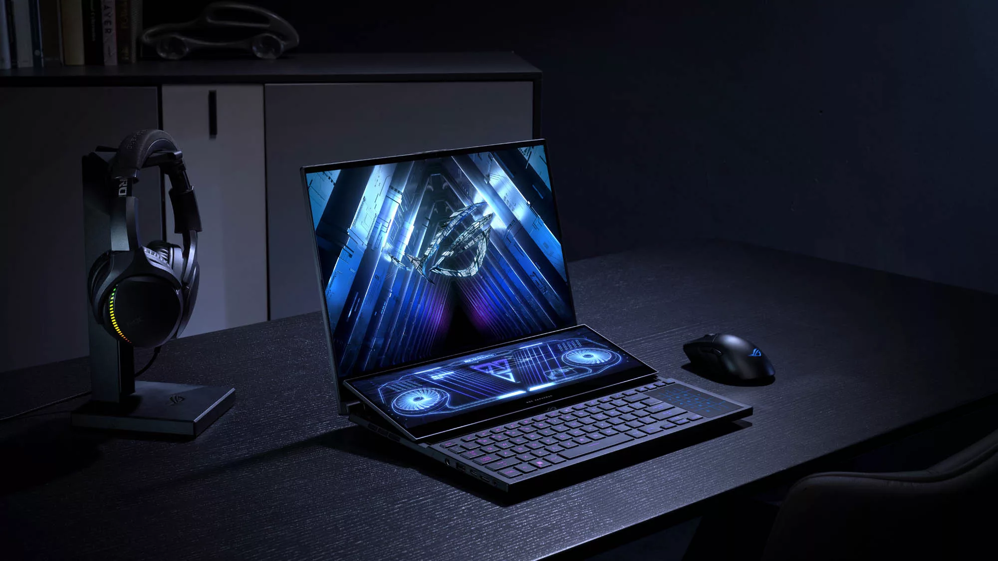 The ROG Zephyrus Duo 16 sitting open on a black table.