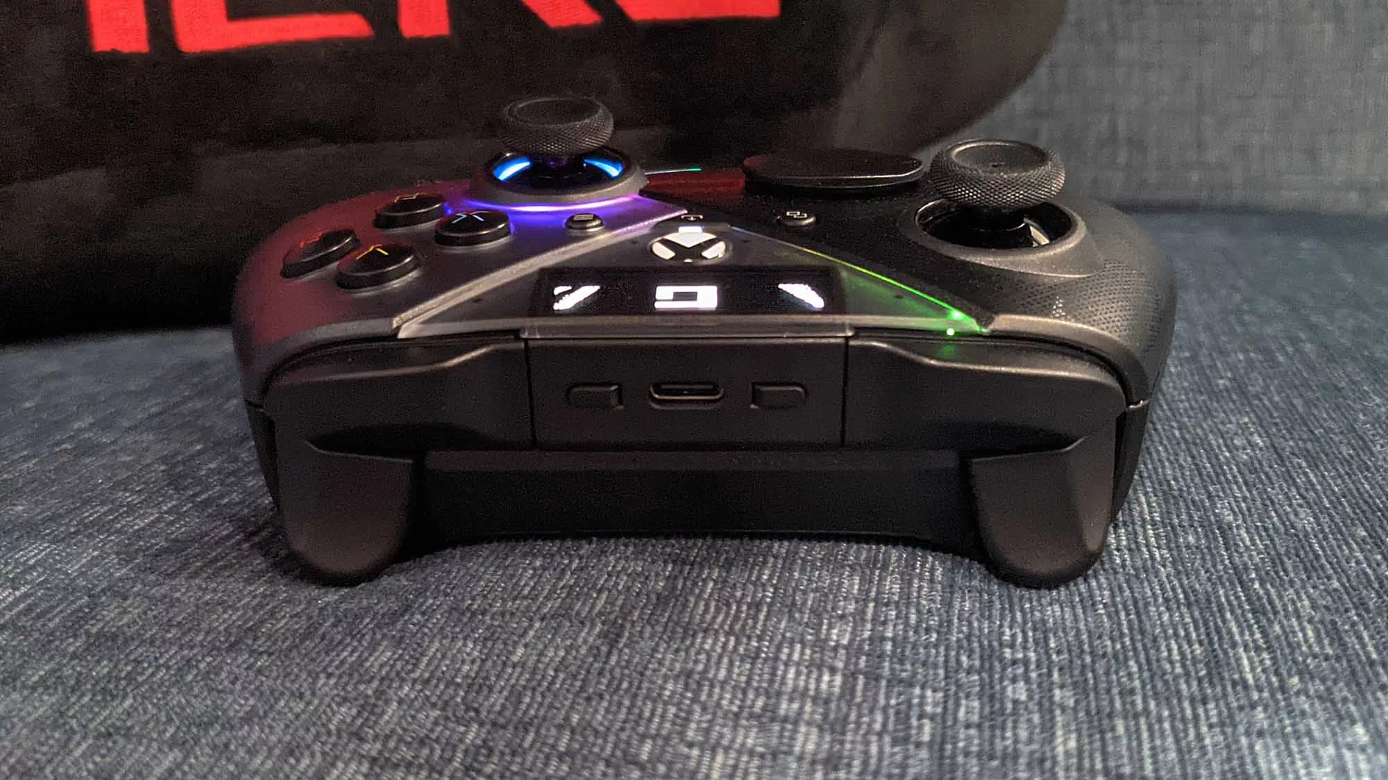 Top view of the ROG Raikiri Pro controller on a couch.
