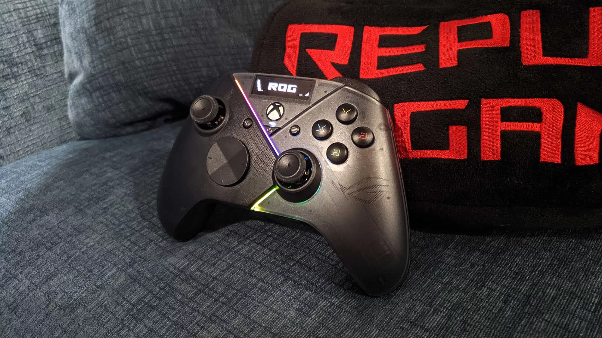 Front view of the ROG Raikiri Pro controller on a couch.
